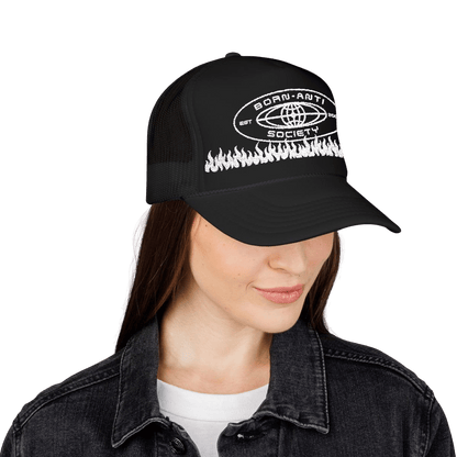 Born Anti Embroidered Foam Trucker Hat in Black worn on model